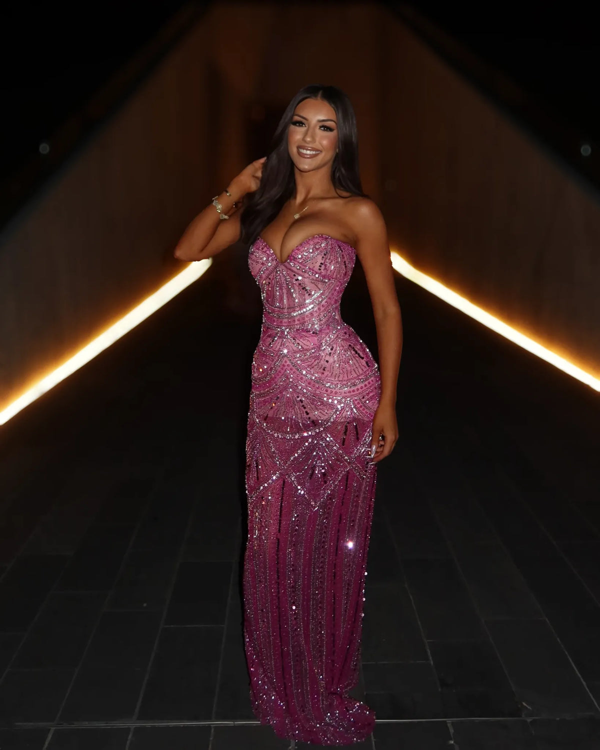 Rose pink crystal corset mermaid evening gown featuring dense geometric beadwork and sweetheart neckline