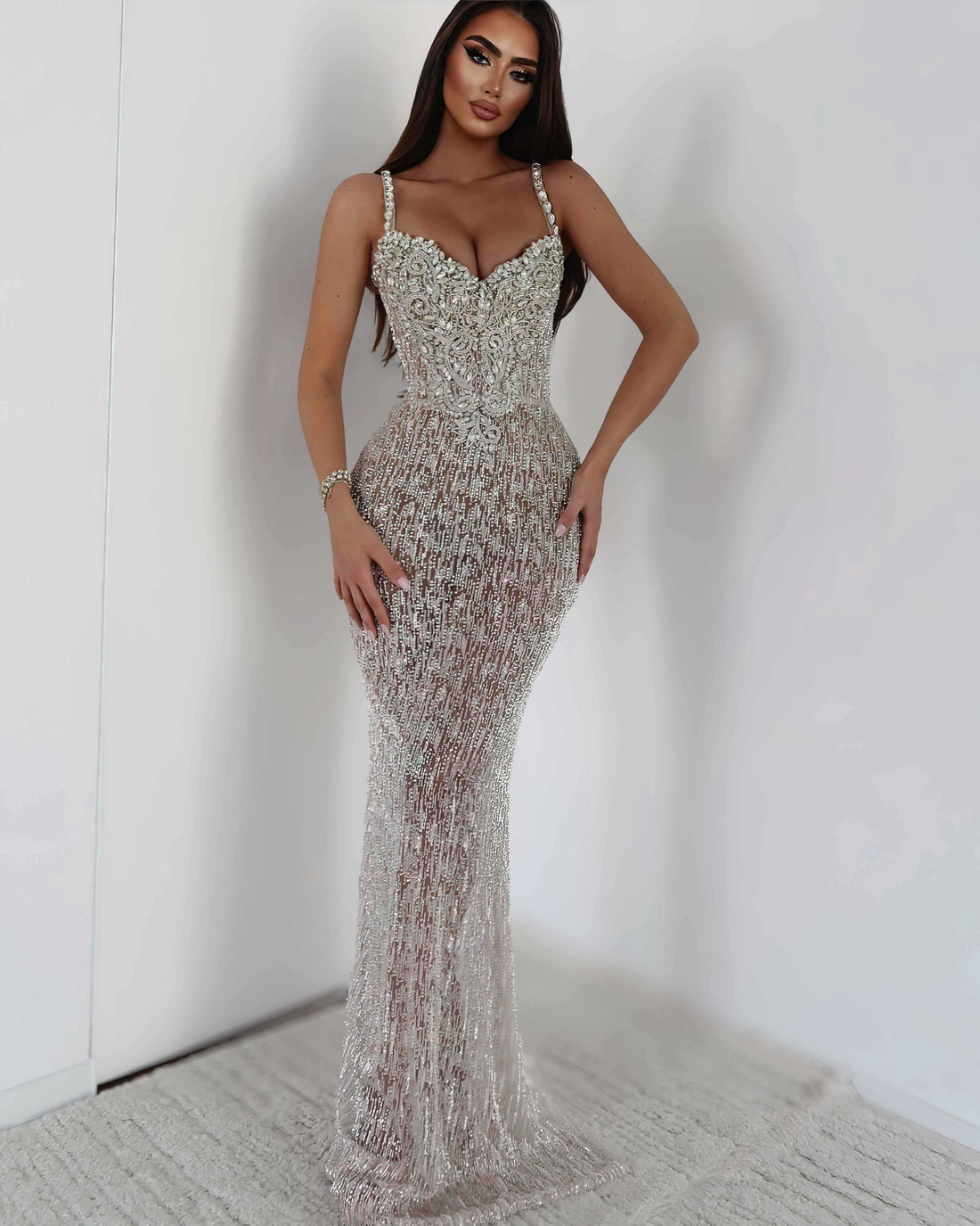 Silver crystal embellished corset gown showing structured bodice fit