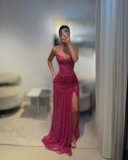 Fuchsia Crystal Strapless Evening Gown with Draped Skirt and High Slit
