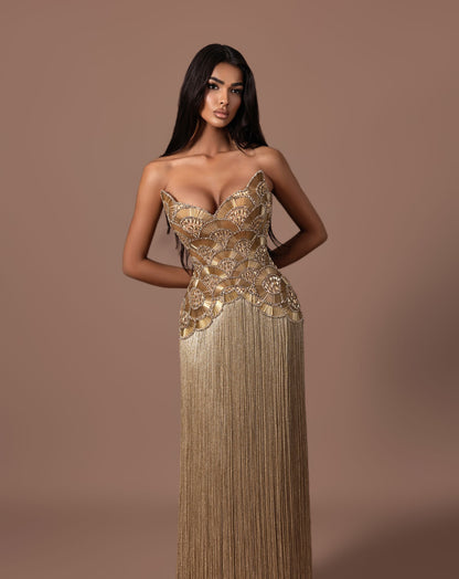 Gold beaded corset evening gown with sculpted strapless bodice