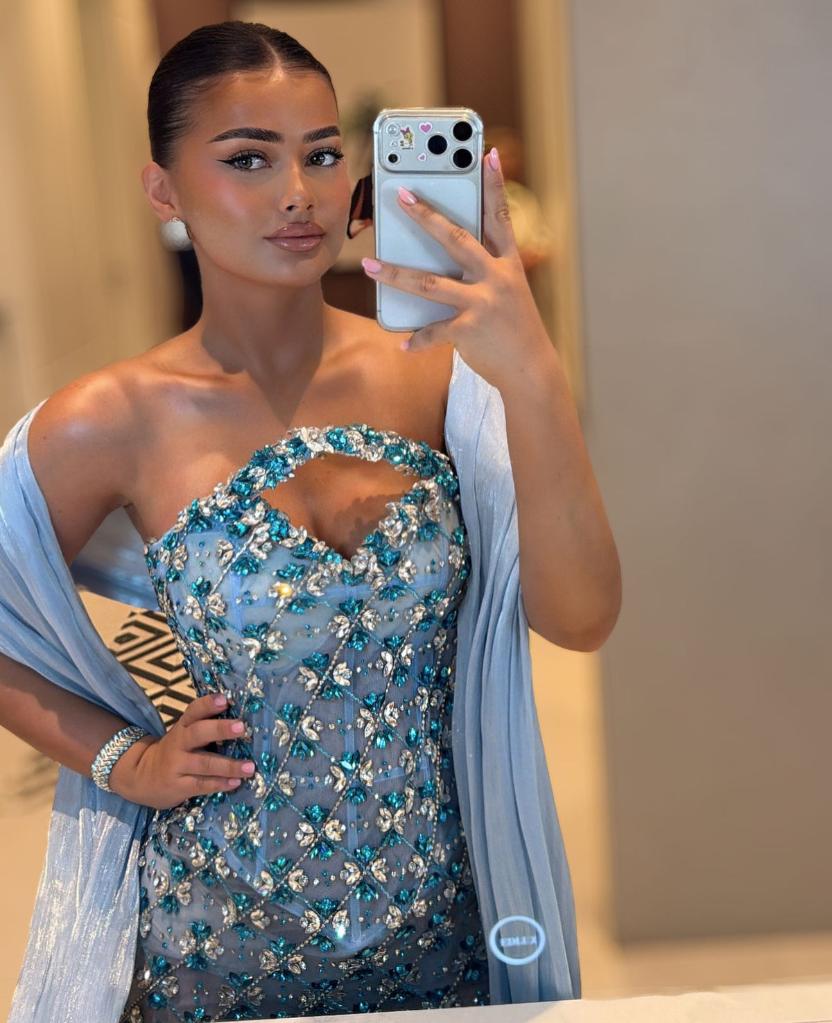 Ice blue crystal evening gown with structured corset bodice