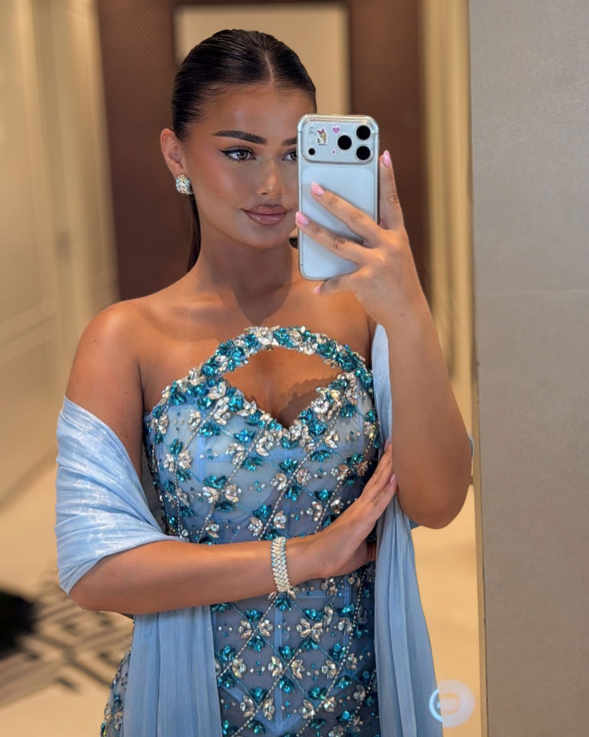Ice blue floral crystal corset gown with sculpted keyhole neckline
