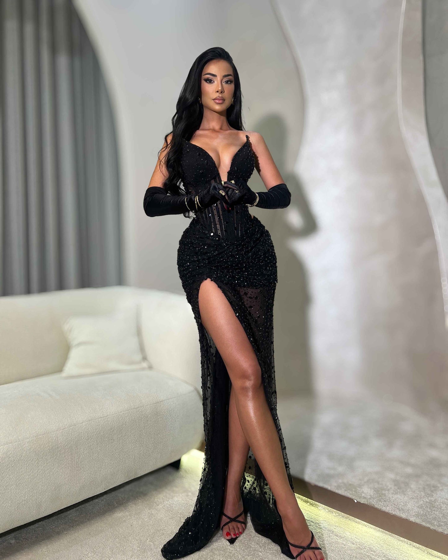Black Crystal Corset Gown with Sheer Draped Skirt and High Slit