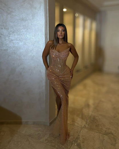 Full-length rose gold crystal strapless corset evening gown with sculpted sweetheart neckline, gathered hips and thigh-high slit